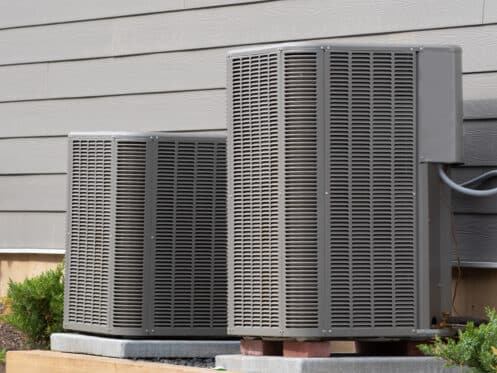 Two AC units outside a Sioux City home