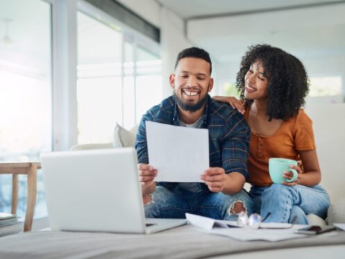 Couple Examining HVAC Maintenance Plan in Sioux City, IA